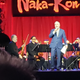 Eric Roth addresses the audience during the Open World concert.